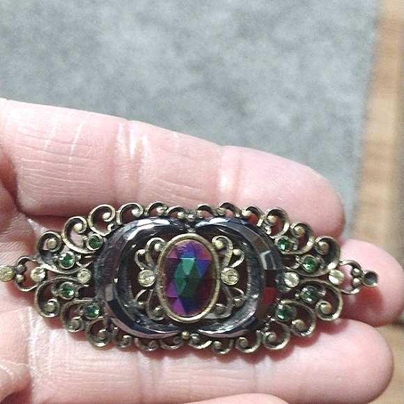 1928 Jewelry Company Jewelry - 1928 JEWELRY CO. BROOCH RAINBOW AND GREEN RHINESTONE FILIGREE BACKING 3"